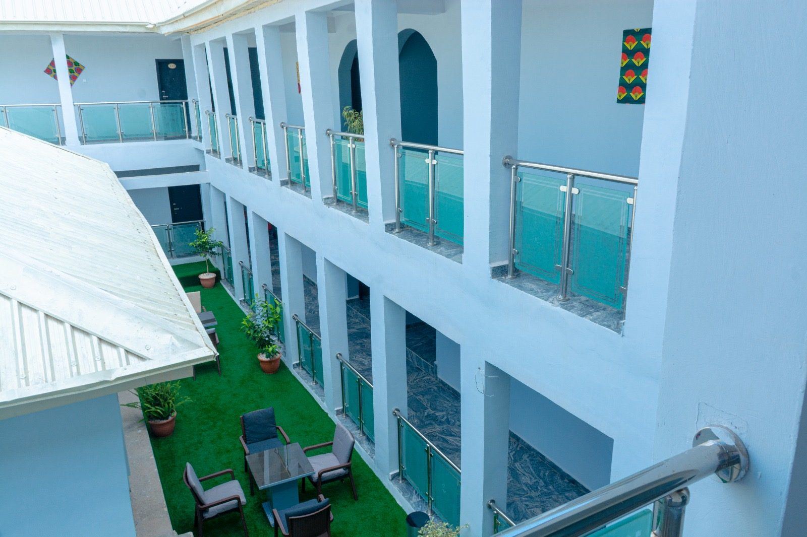 The upper colonnade at House 7, looking along the balcony walkway.
